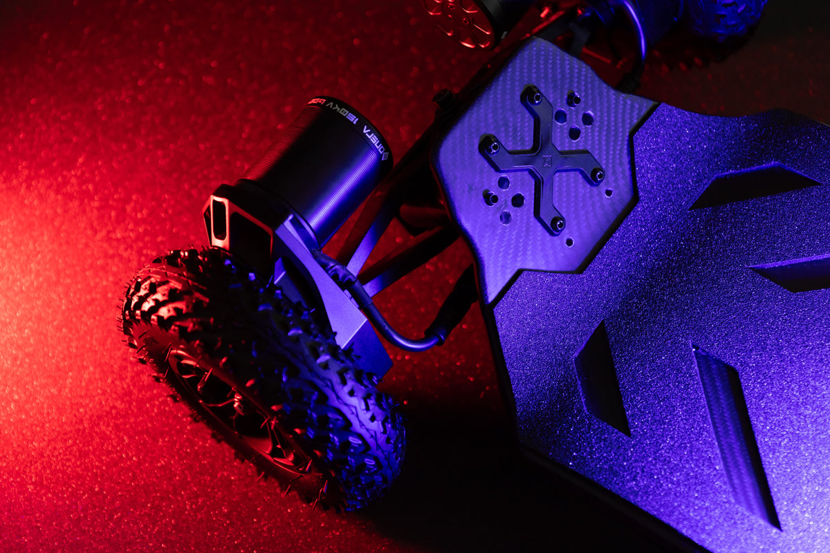 ONSRA VELAR truck baseplate in red and blue light