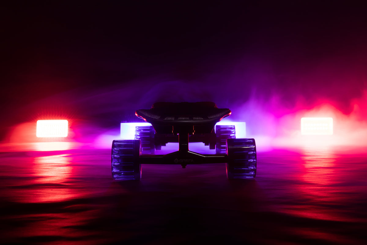 ONSRA Challenger Pro with front and rear lights at night