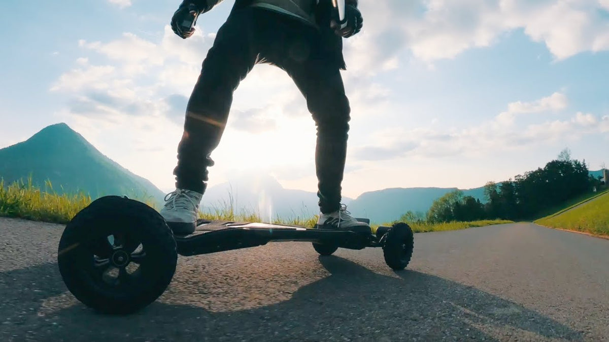 ONSRA VELAR electric skateboard riding to the top of a hill, video preview