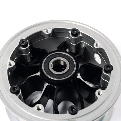 Rear view of CNC electric skateboard hub showing precision machined pulley mounting points and integrated bearing seat