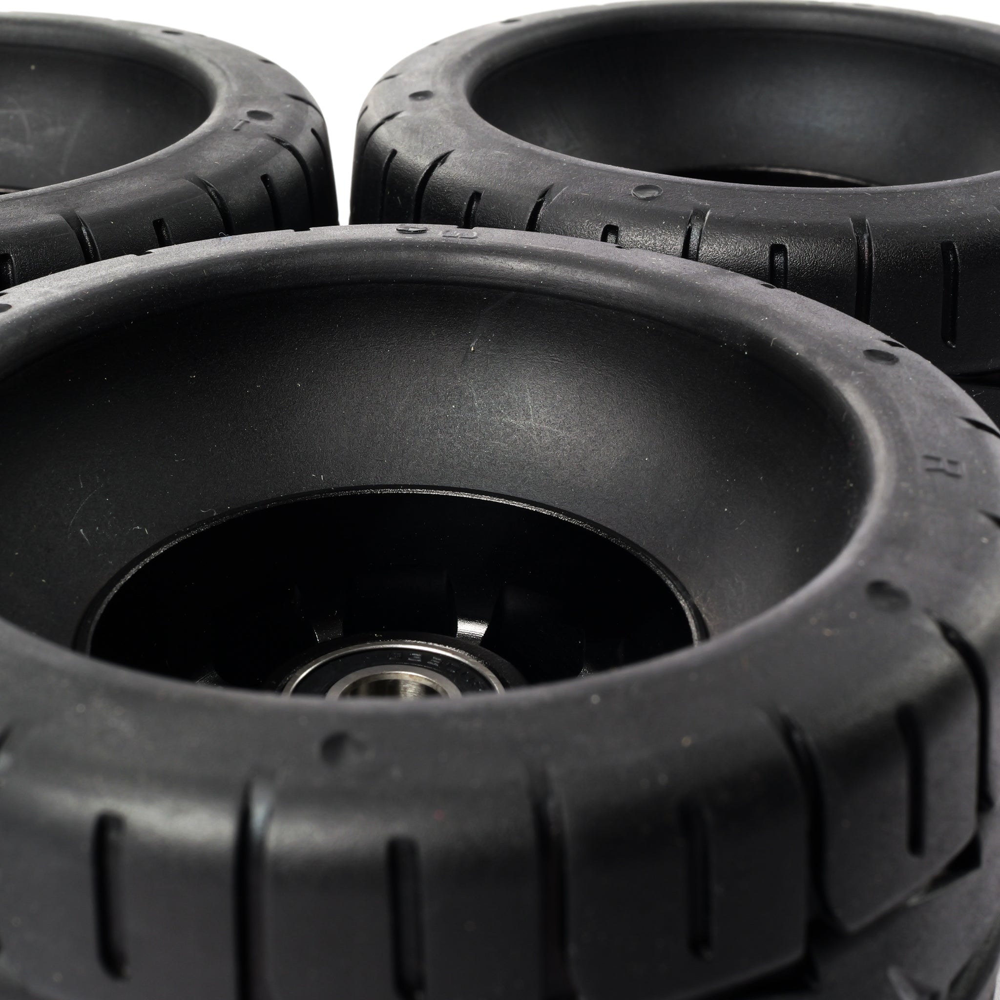 Onsra 115mm x 65mm 70A black rubber electric skateboard wheel with street tread pattern